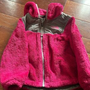 Good condition toddler girls pink Northface fleece with hood. Size 2T.
